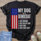 Dark t-shirt with American flag and text "My dog is a democrat" listing four benefits.