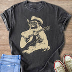 Pug wearing a cowboy hat playing an acoustic guitar.