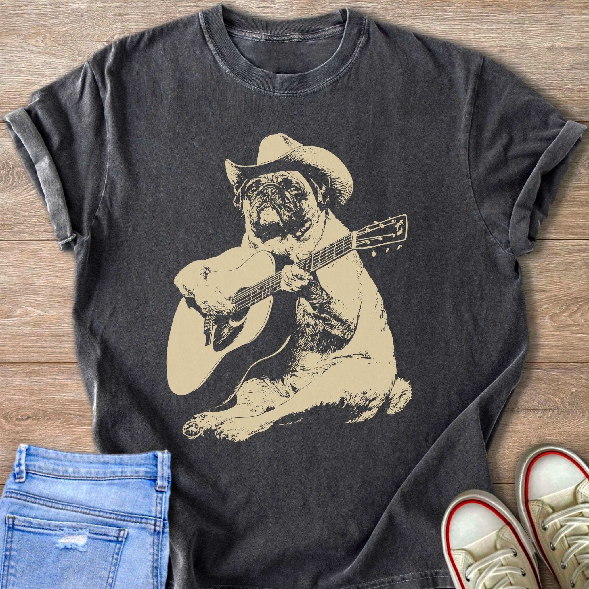 Pug wearing a cowboy hat playing an acoustic guitar.