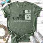 Green t-shirt with text "BOLD BADASS SUPERHUMAN ...and I like my dog more than people".