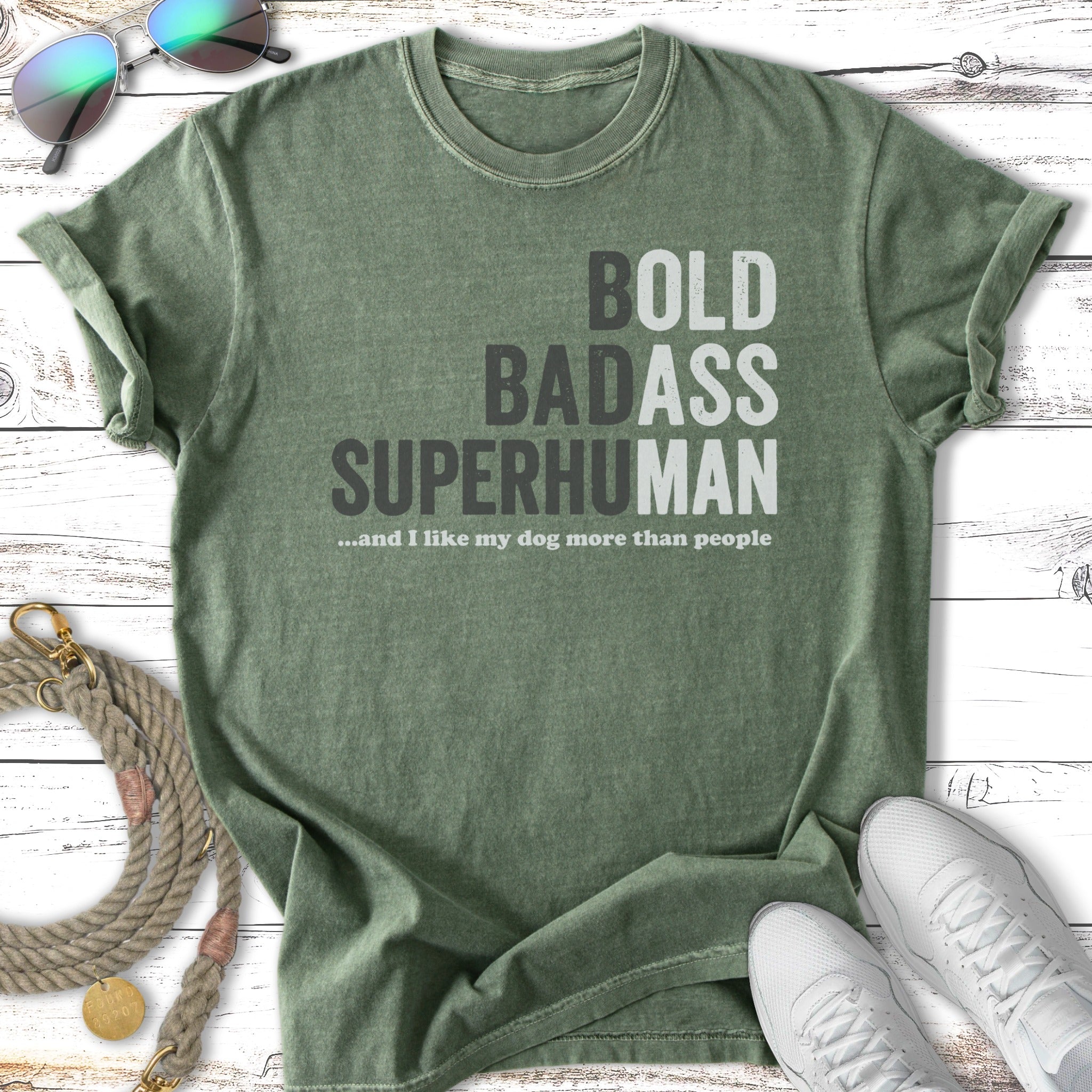 Green t-shirt with text "BOLD BADASS SUPERHUMAN ...and I like my dog more than people".