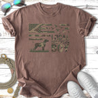 Distressed graphic tee with camouflage flag, dog, and "Local Southern Boy" text.