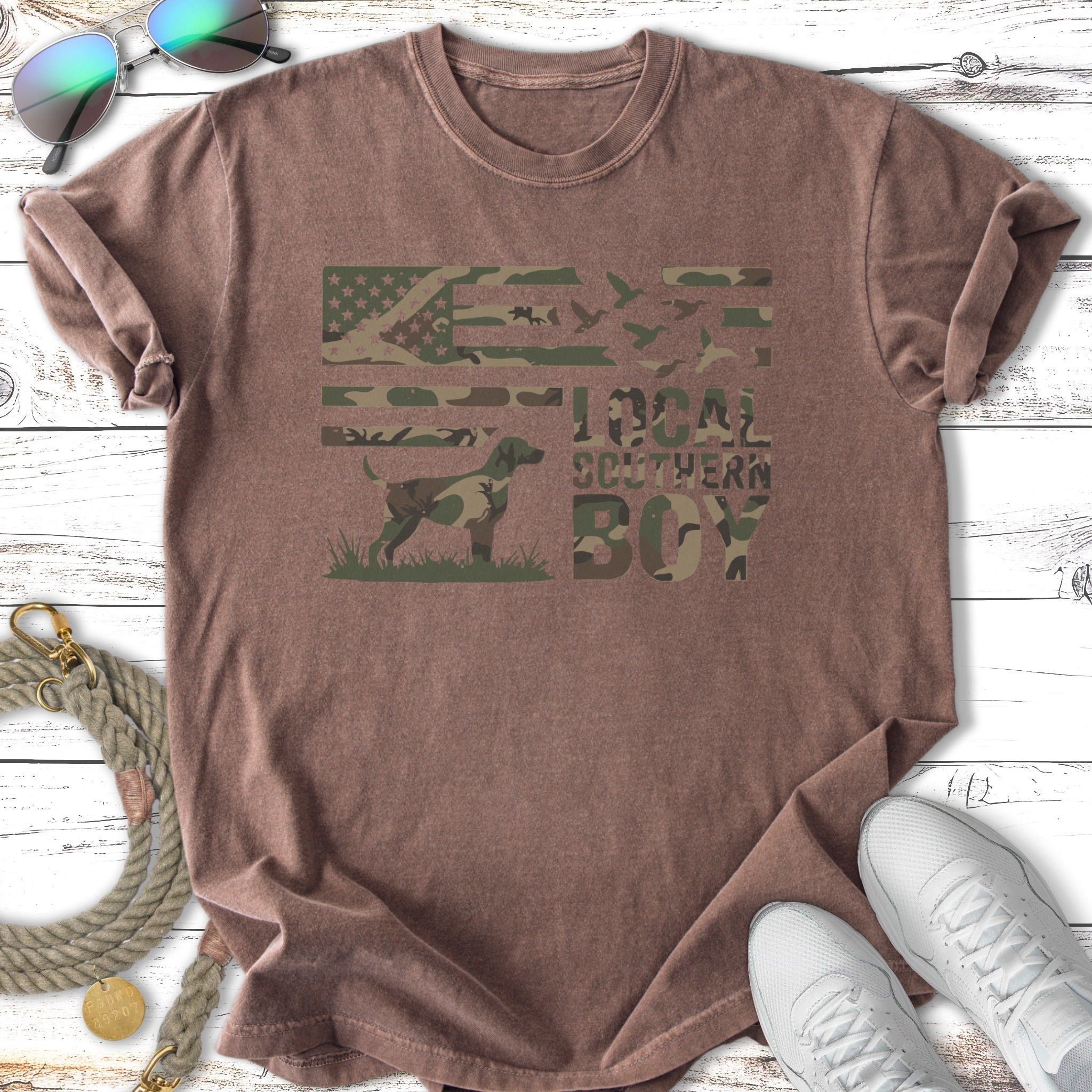 Distressed graphic tee with camouflage flag, dog, and "Local Southern Boy" text.