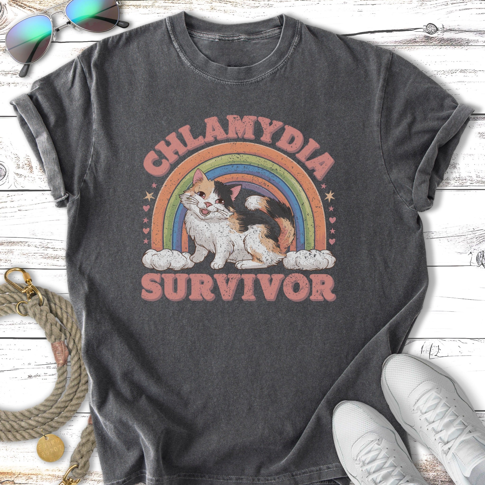 Cat graphic with rainbow, clouds, and text "CHLAMYDIA SURVIVOR".