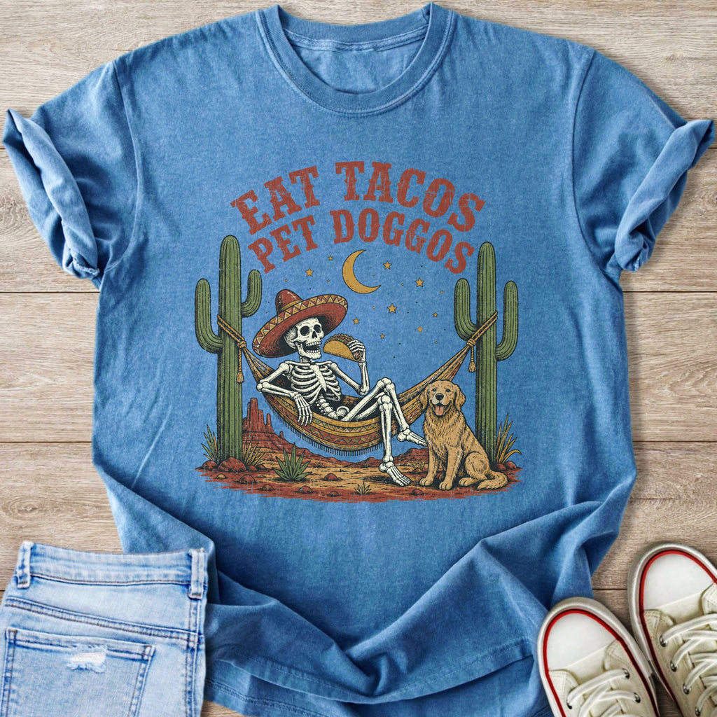 Skeleton in hammock eating taco with dog. Text: Eat Tacos Pet Doggos.