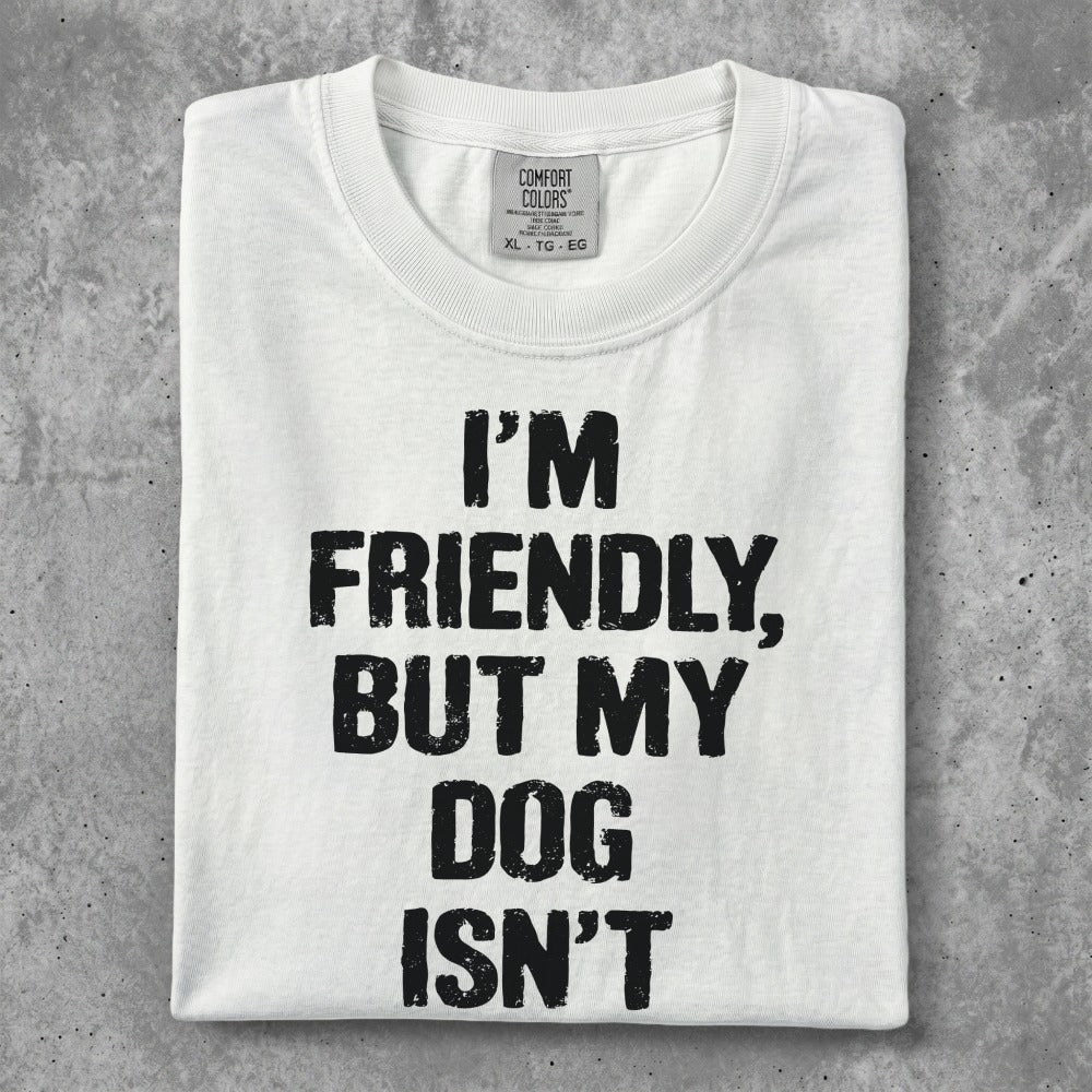 White t-shirt with black text that reads "I'm Friendly, But My Dog Isn't".