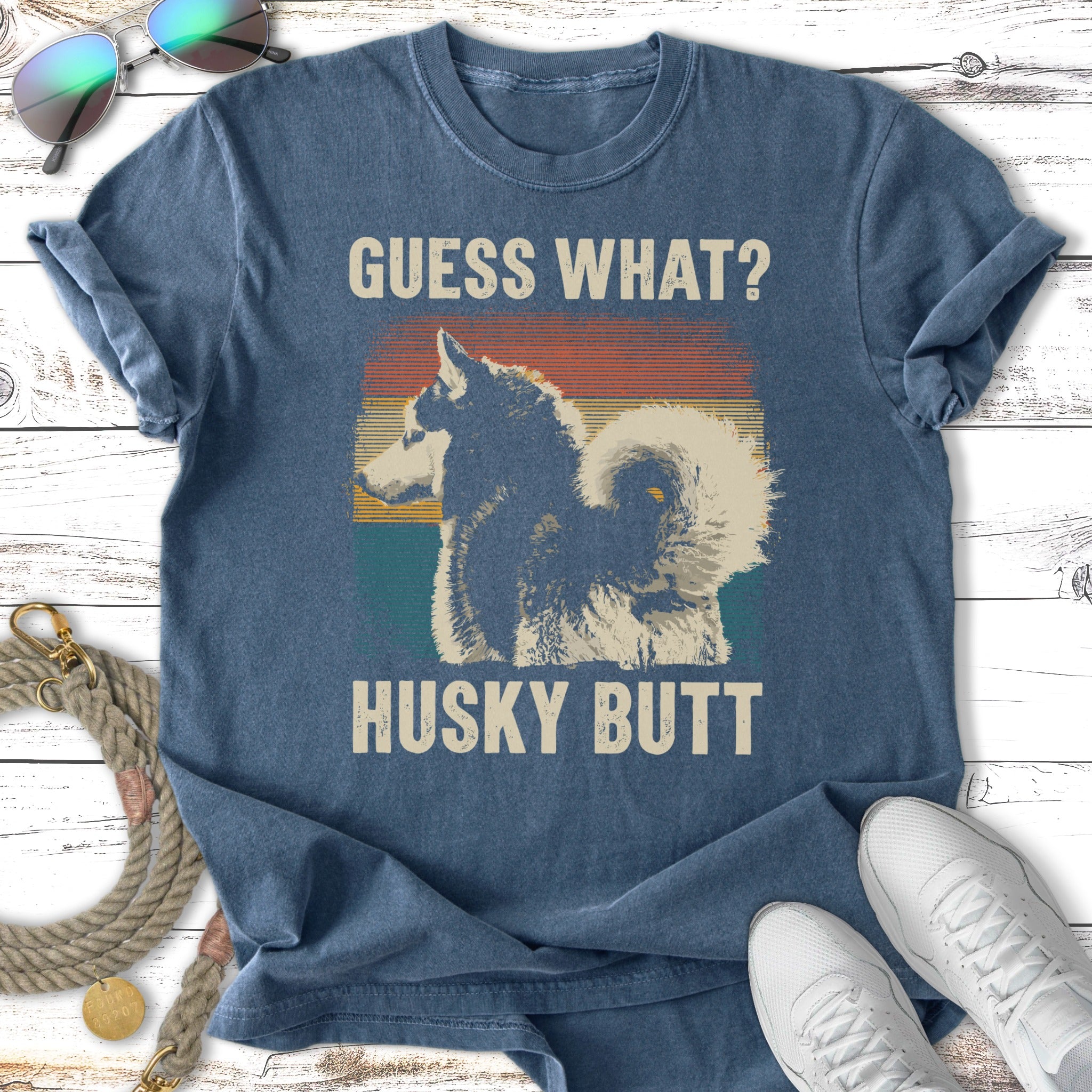 Distressed t-shirt with "GUESS WHAT? HUSKY BUTT" and a husky graphic.