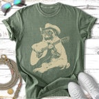 Pug wearing a cowboy hat plays an acoustic guitar.