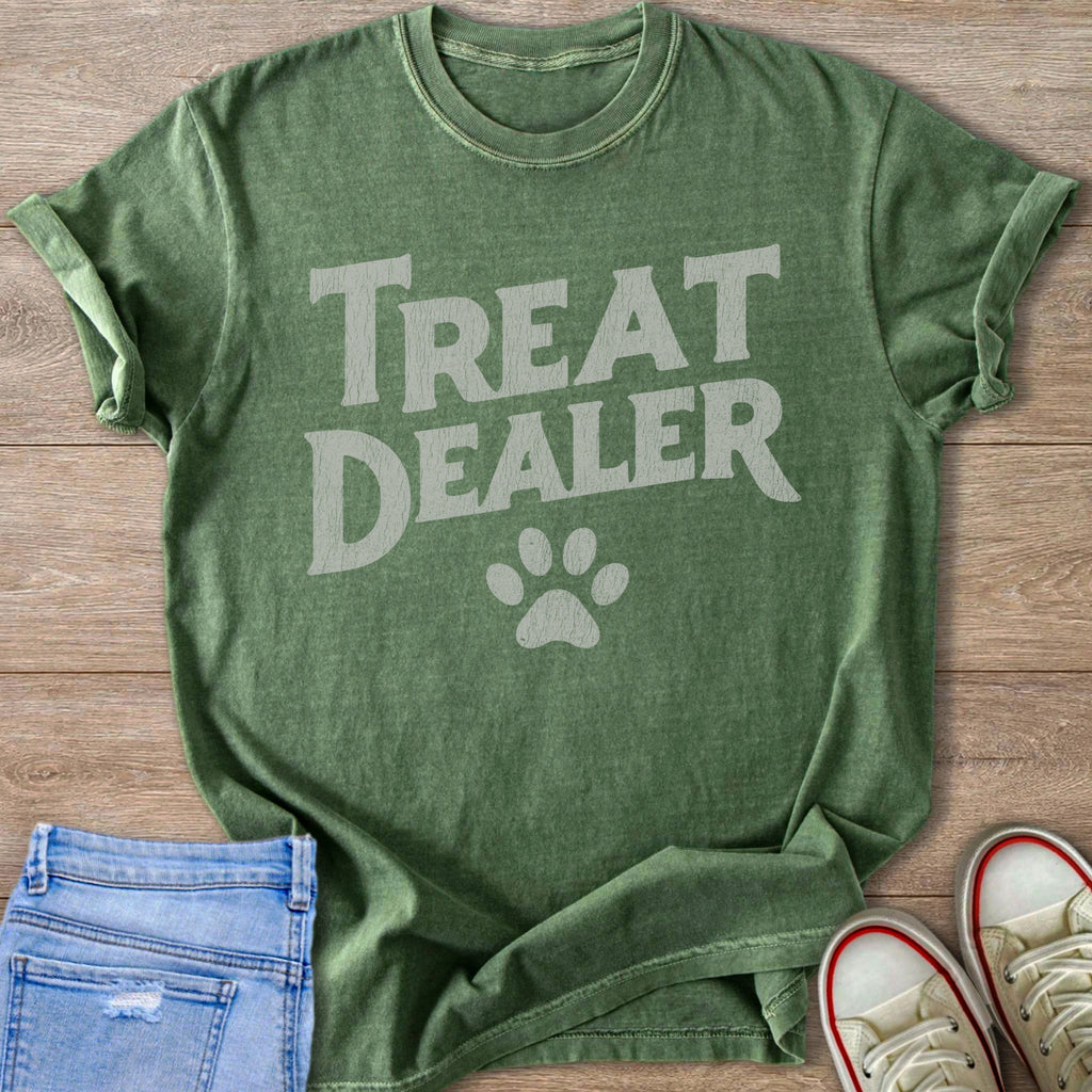 Green t-shirt with "TREAT DEALER" text and paw print graphic.