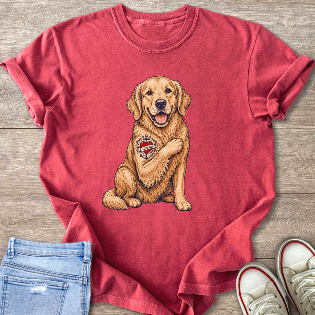 Golden Retriever with "I Love Mom" tattoo on a red t-shirt.
