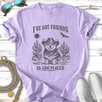 Corgi in cowboy hat with cacti and text "I've got friends in low places".