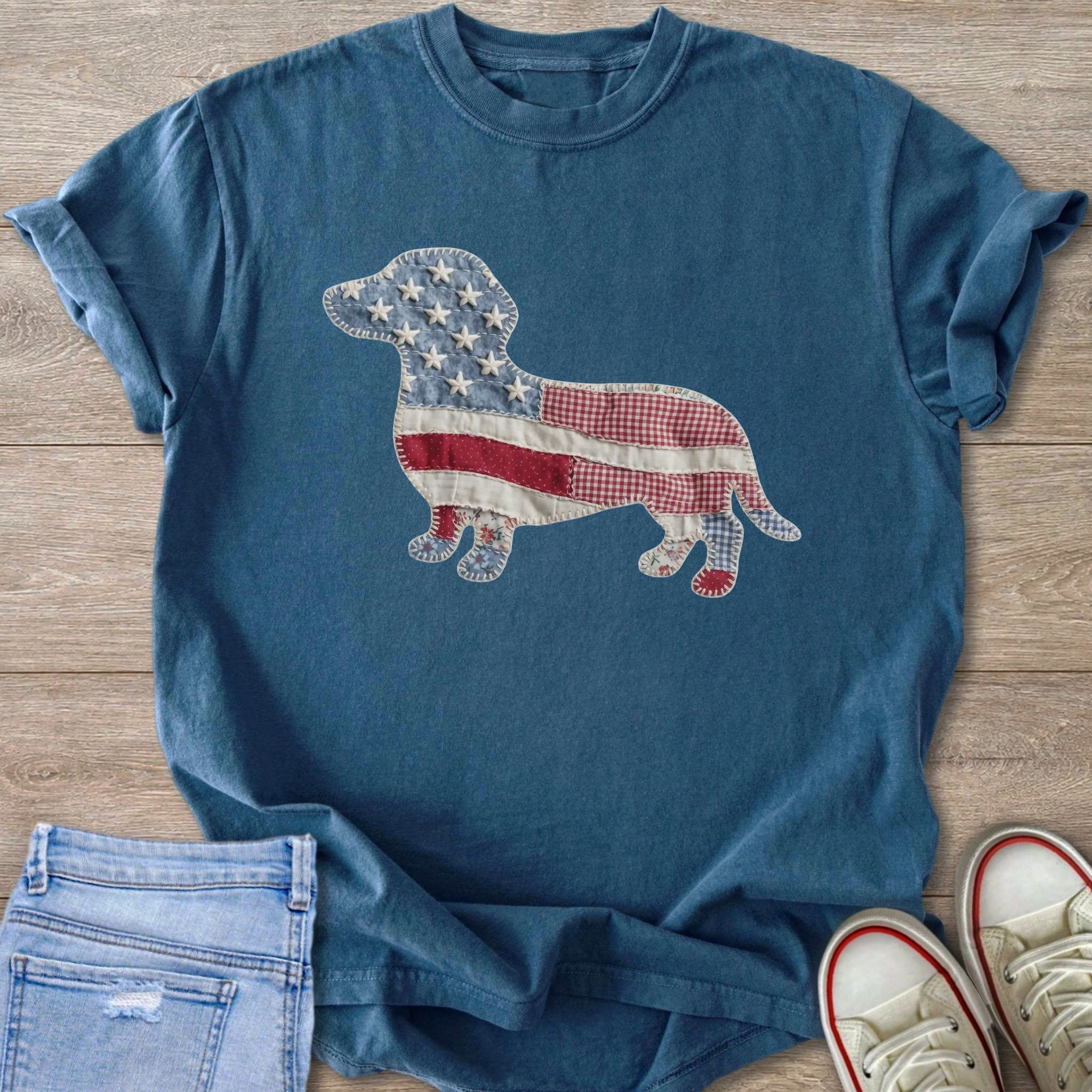 Blue t-shirt with an American flag dachshund applique and distressed denim jeans.