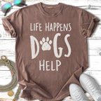 Brown t-shirt with "Life Happens Dogs Help" and paw print graphic.