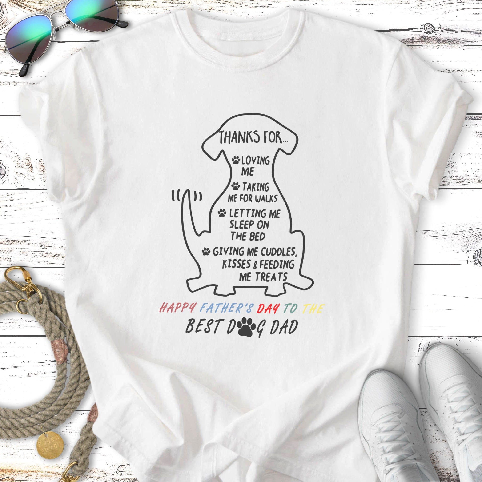 White t-shirt with black text "Thanks for loving me..." and "Happy Father's Day to the best dog dad".