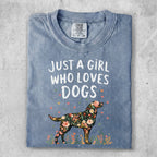 Blue t-shirt with floral dog and "Just a girl who loves dogs" text.