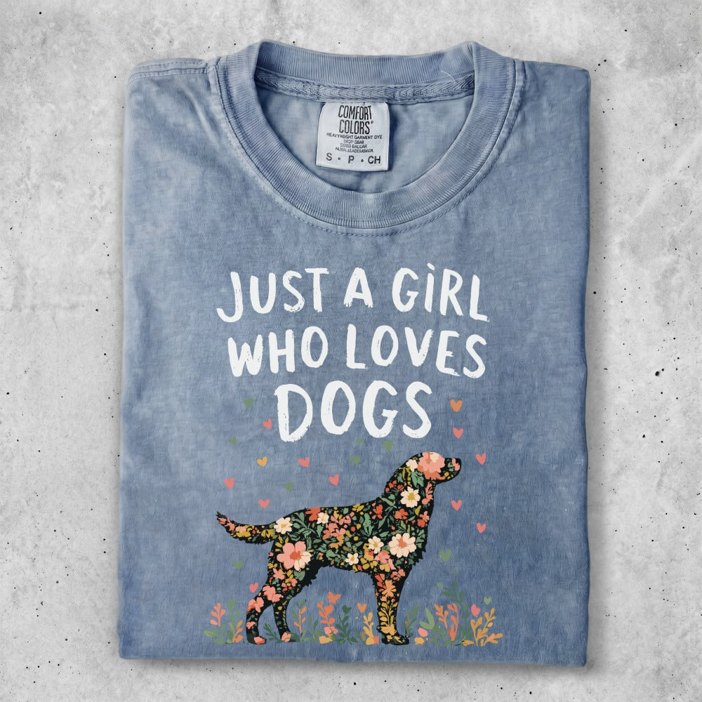 Blue t-shirt with floral dog and "Just a girl who loves dogs" text.