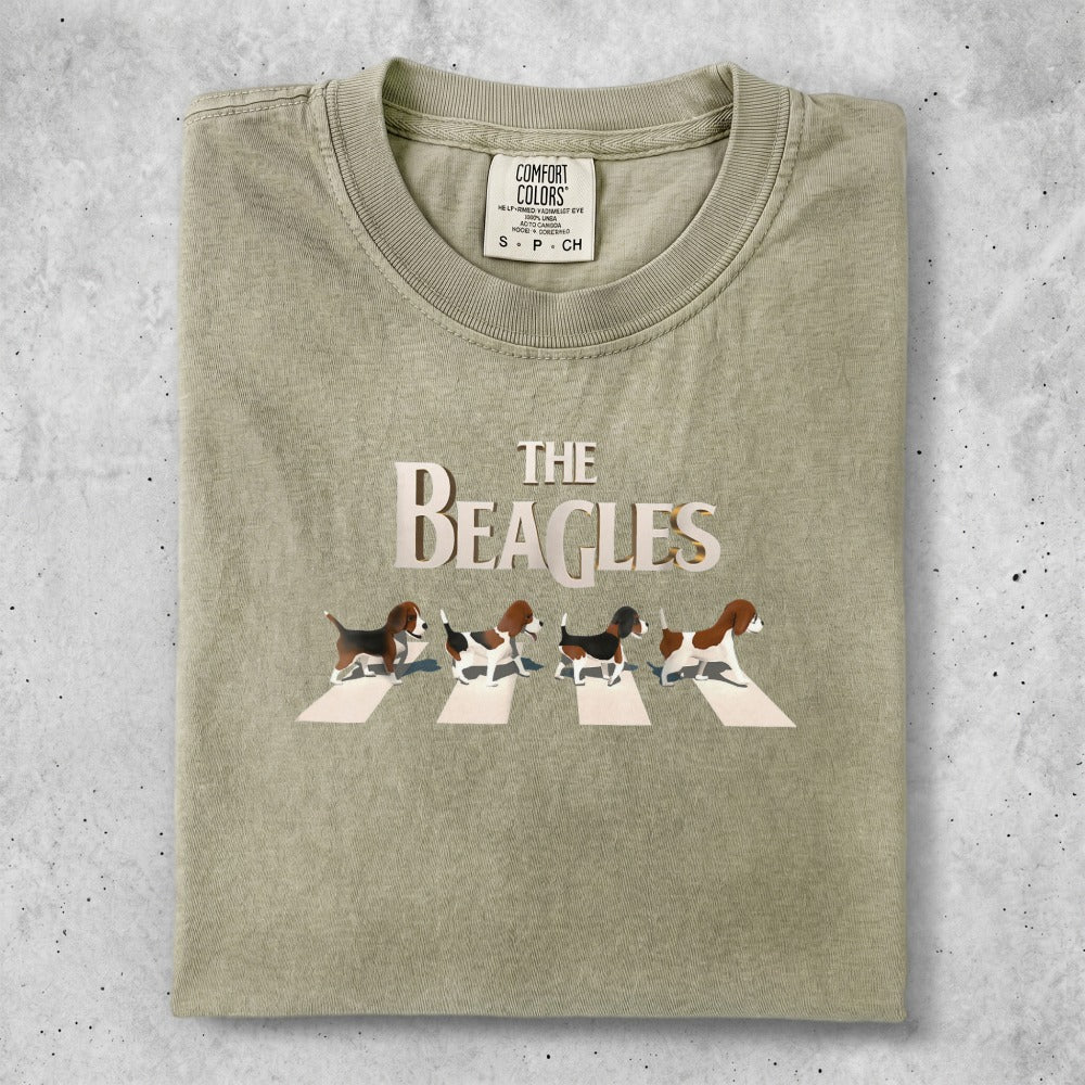 The Beatles Abbey Road album cover art on a beige t-shirt.