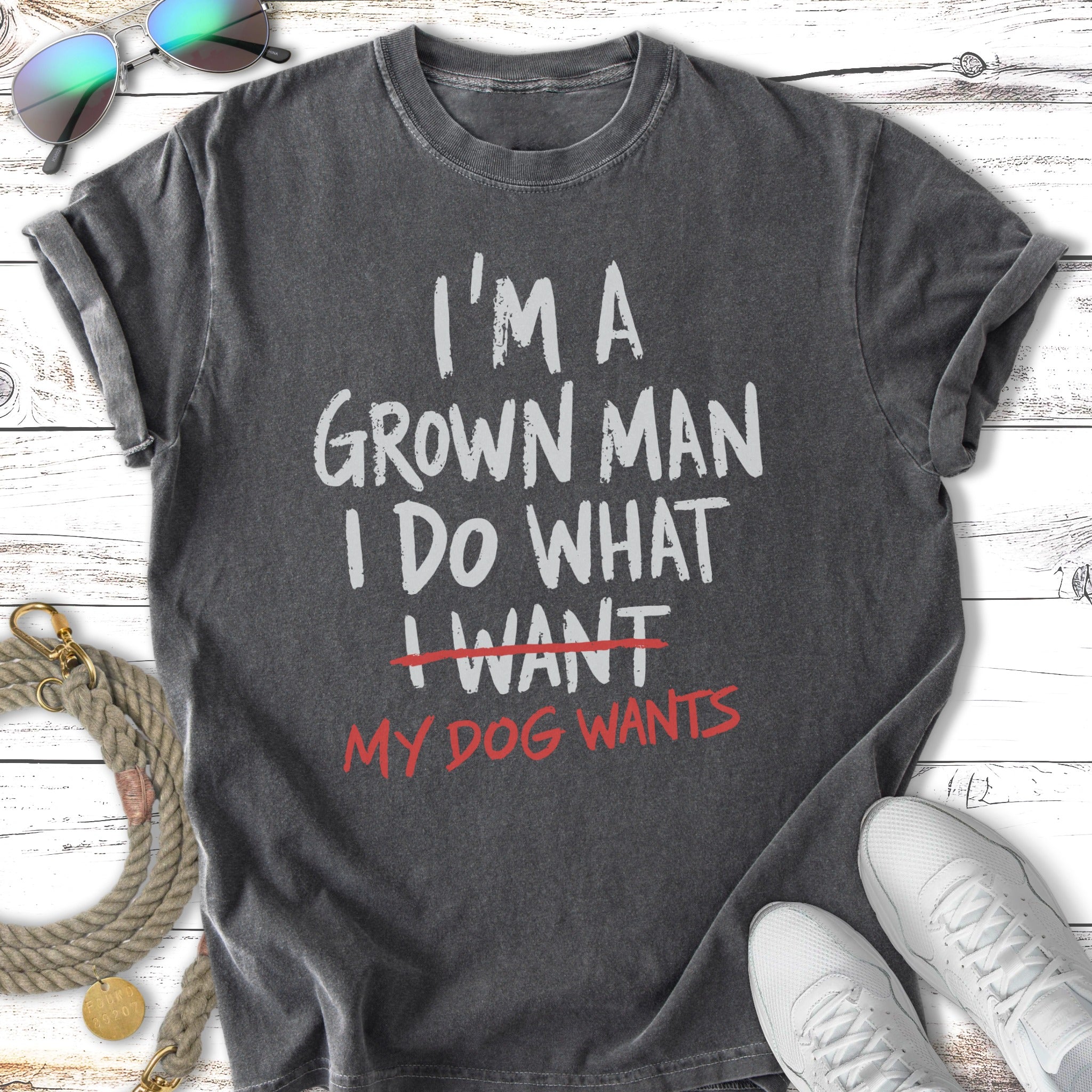 T-shirt with text "I'm a grown man, I do what I want, my dog wants."