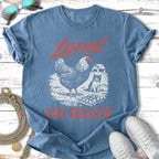 T-shirt graphic with chicken, cat, barn, and "Local Egg Dealer" text.