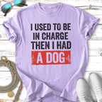 Purple t-shirt with "I used to be in charge then I had a dog" text.