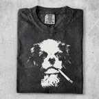Dark gray t-shirt with a black and white graphic of a dog holding a cigarette in its mouth.
