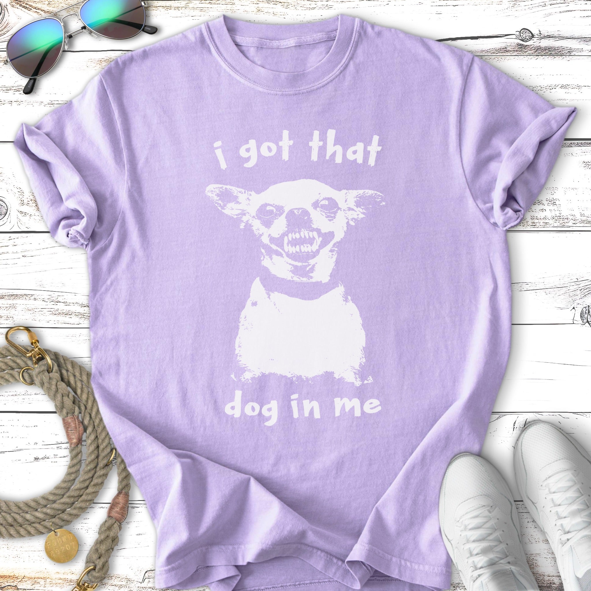 Lilac t-shirt with white distressed dog graphic and text "I got that dog in me".