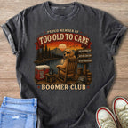 Dark t-shirt with "Proud Member of Too Old To Care Boomer Club" graphic.