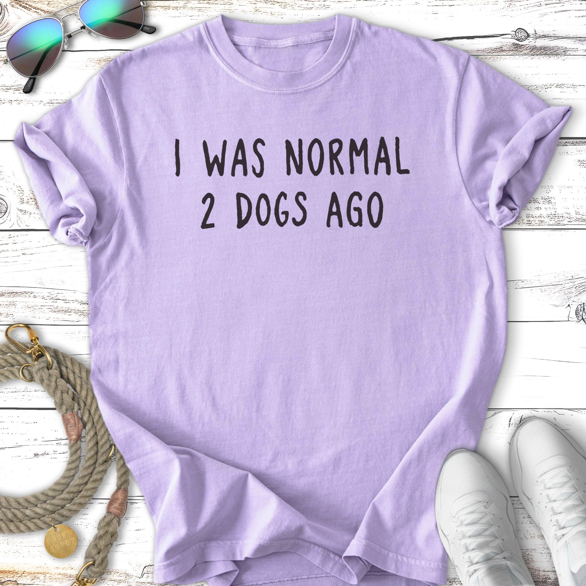 Lavender t-shirt with "I WAS NORMAL 2 DOGS AGO" text.