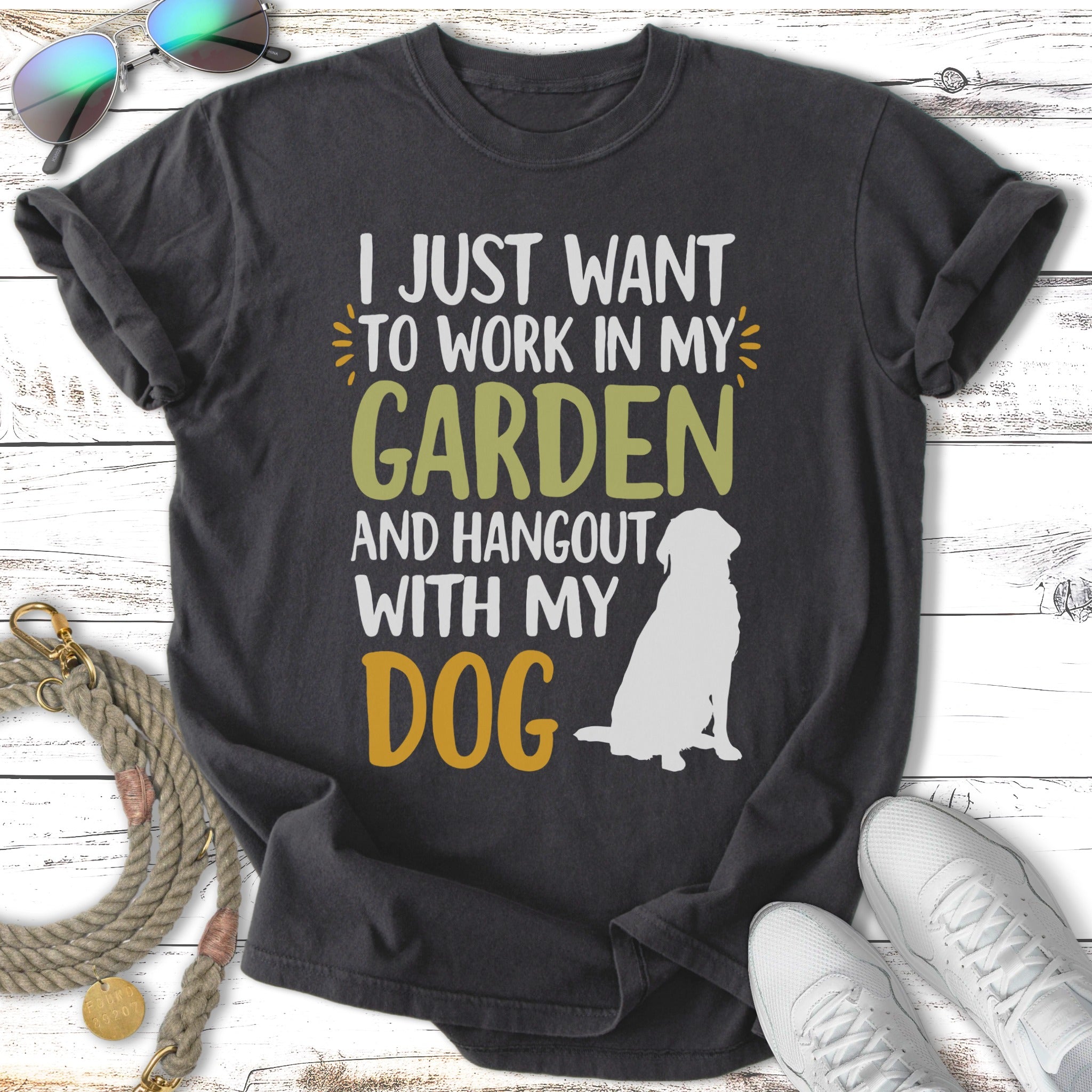 Dark t-shirt with white text "I just want to work in my garden and hangout with my dog".