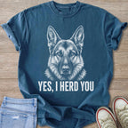 Blue t-shirt with a white sketch of a German Shepherd and the text "YES, I HERD YOU."