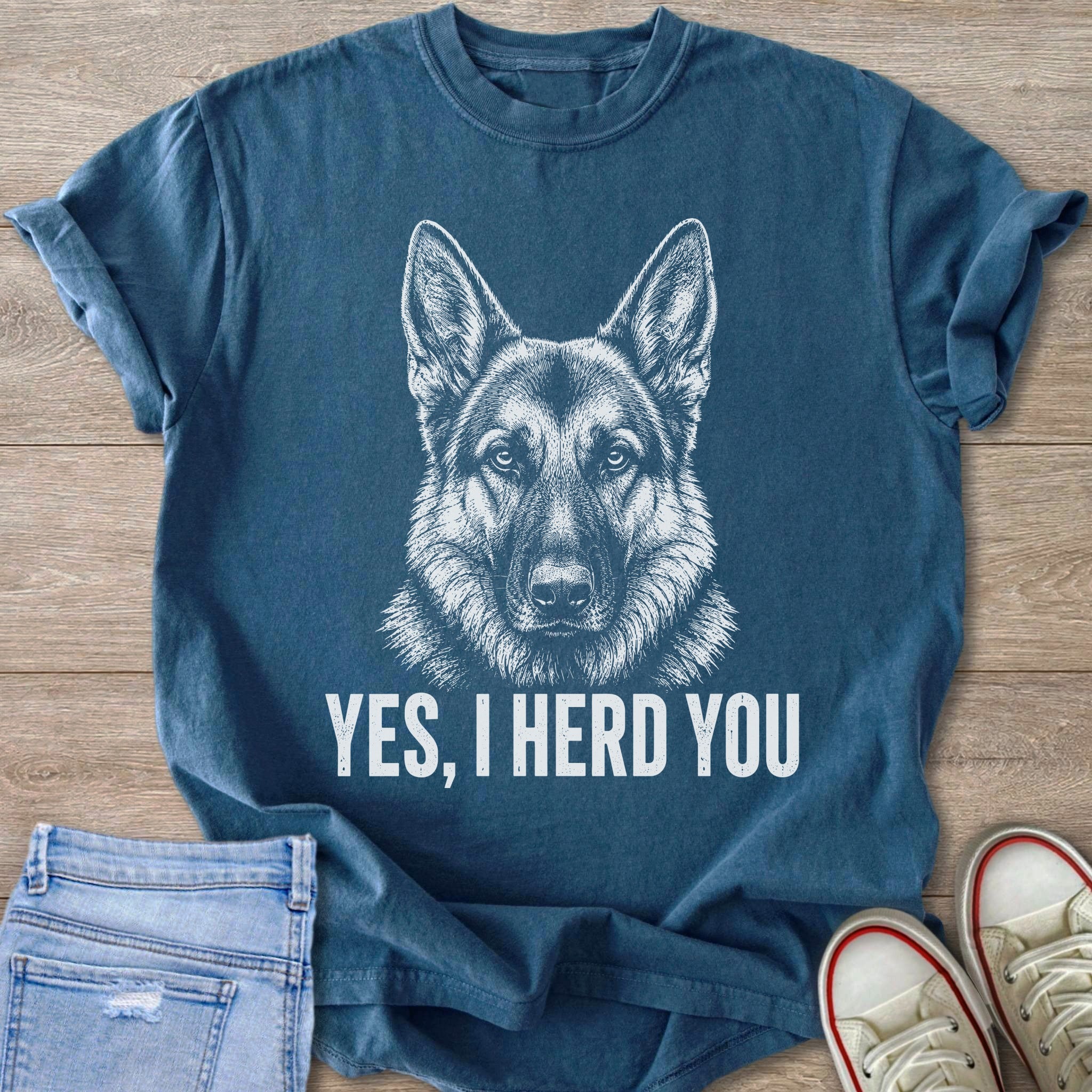 Blue t-shirt with a white sketch of a German Shepherd and the text "YES, I HERD YOU."