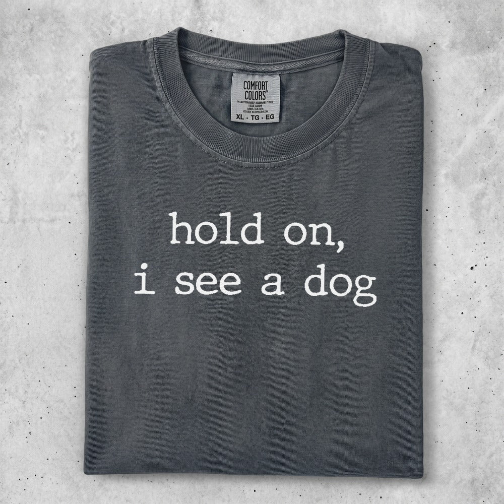 Dark gray t-shirt with "hold on, i see a dog" text.