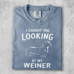 Blue t-shirt with "I CAUGHT YOU LOOKING AT MY WEINER" and dachshund graphic.