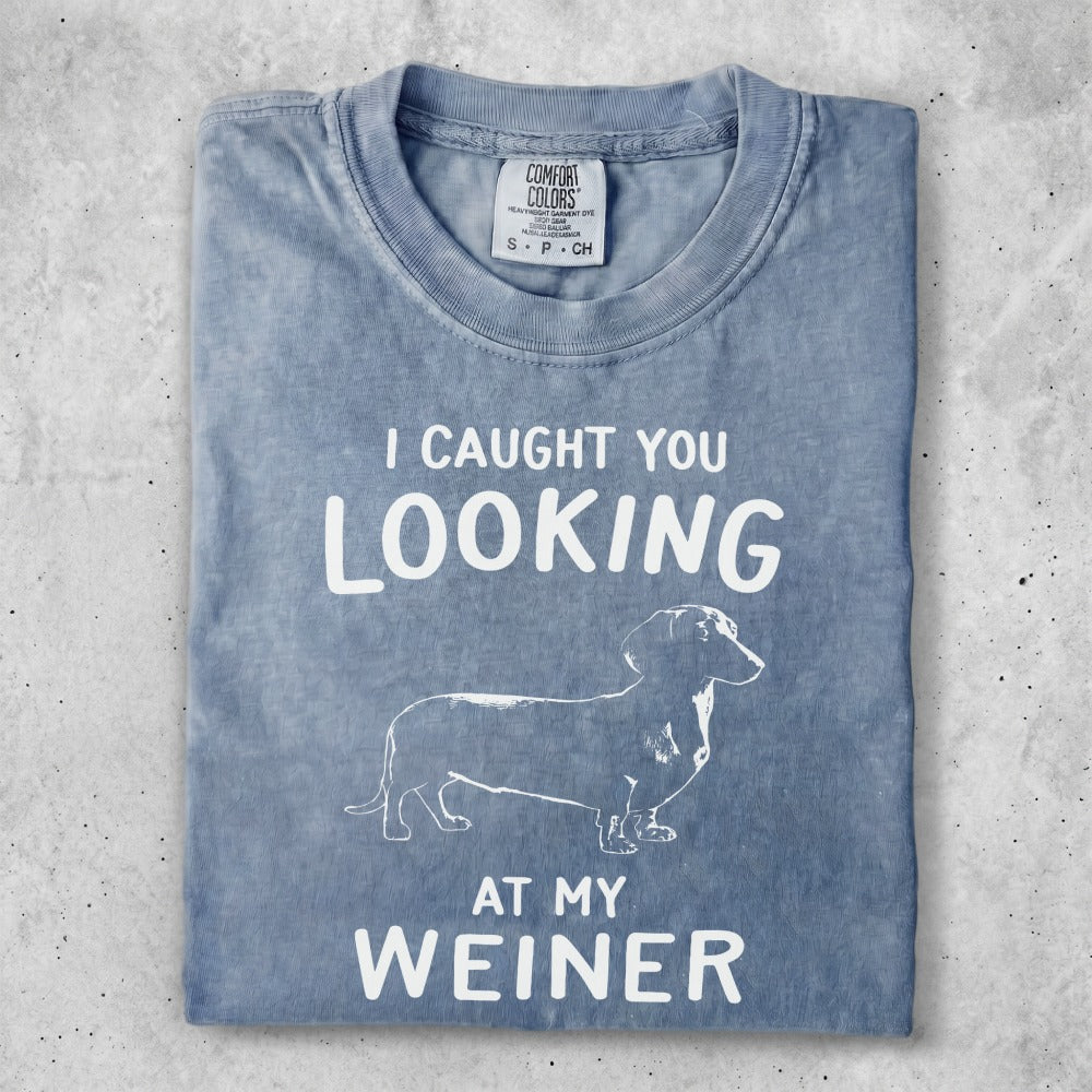 Blue t-shirt with "I CAUGHT YOU LOOKING AT MY WEINER" and dachshund graphic.