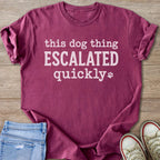 Purple t-shirt with white text: "this dog thing ESCALATED quickly".