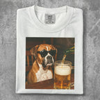 Boxer dog wearing sunglasses, with beer being poured into a mug.
