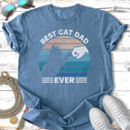 Blue t-shirt with "Best Cat Dad Ever" and a fist bump with a cat silhouette.