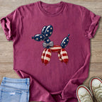 Burgundy t-shirt with a balloon dog graphic in American flag colors.