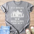 Gray t-shirt with text "IF IT INVOLVES HIKING & DOGS - COUNT ME IN -"