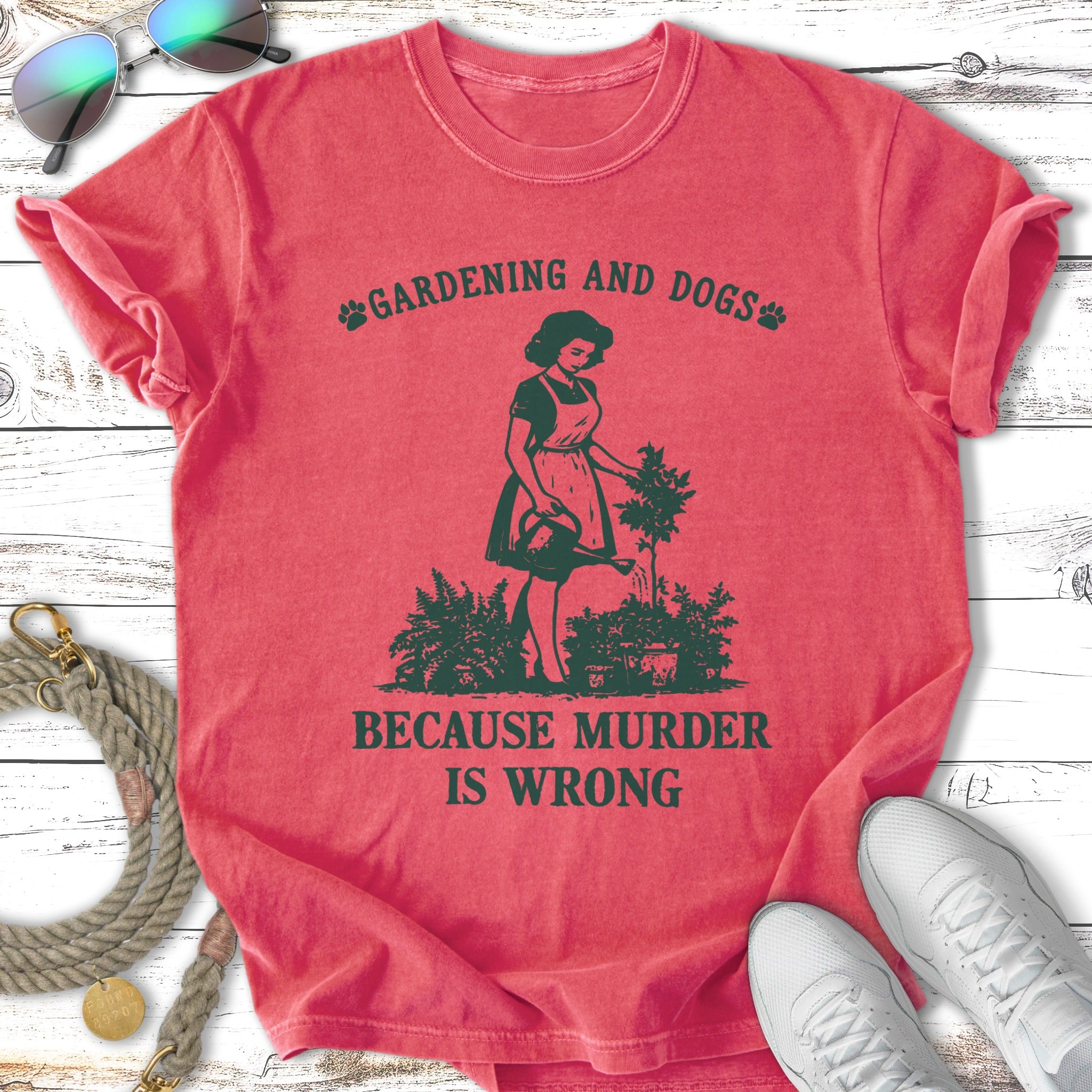 Gardening and Dogs is Wrong slogan with woman watering plants.