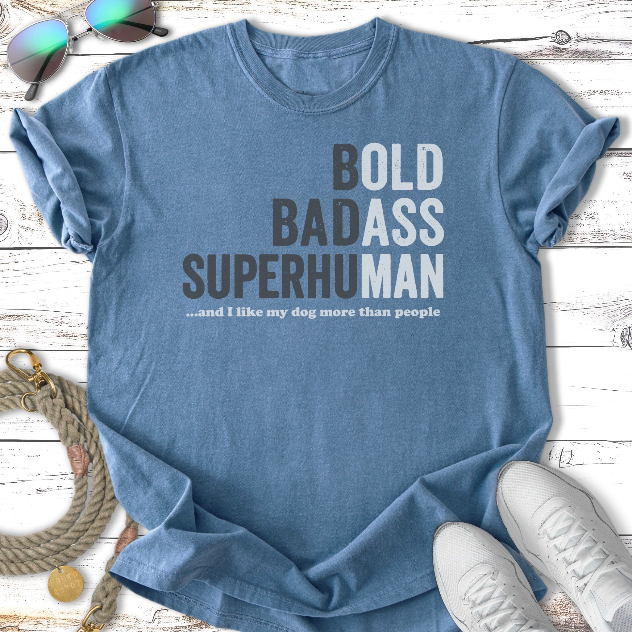 Blue t-shirt with text "BOLD BADASS SUPERHUMAN ...and I like my dog more than people."