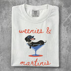 T-shirt with a dachshund in a martini glass and text "weenies & martinis".