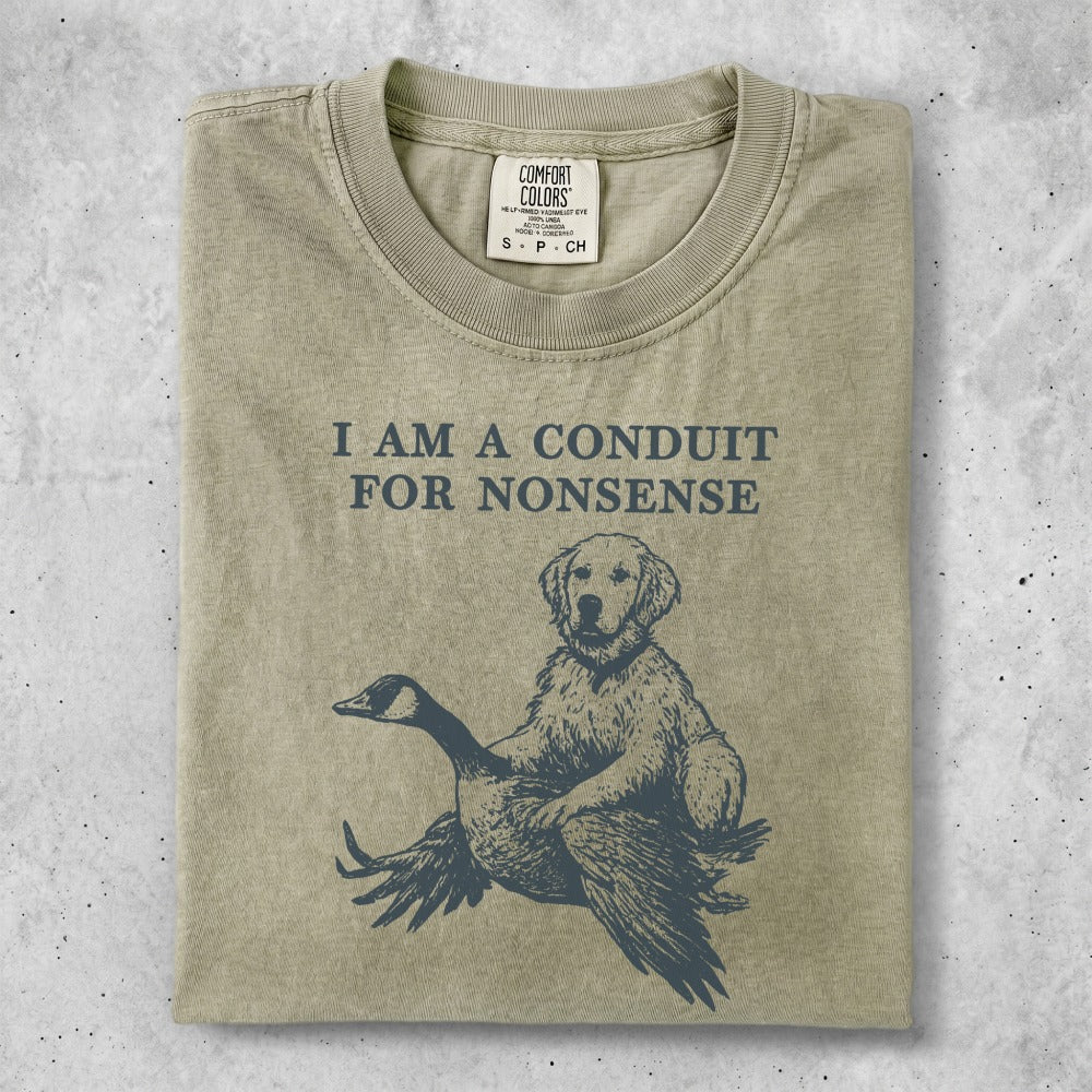 Golden retriever sitting with a goose, text reads "I AM A CONDUIT FOR NONSENSE".