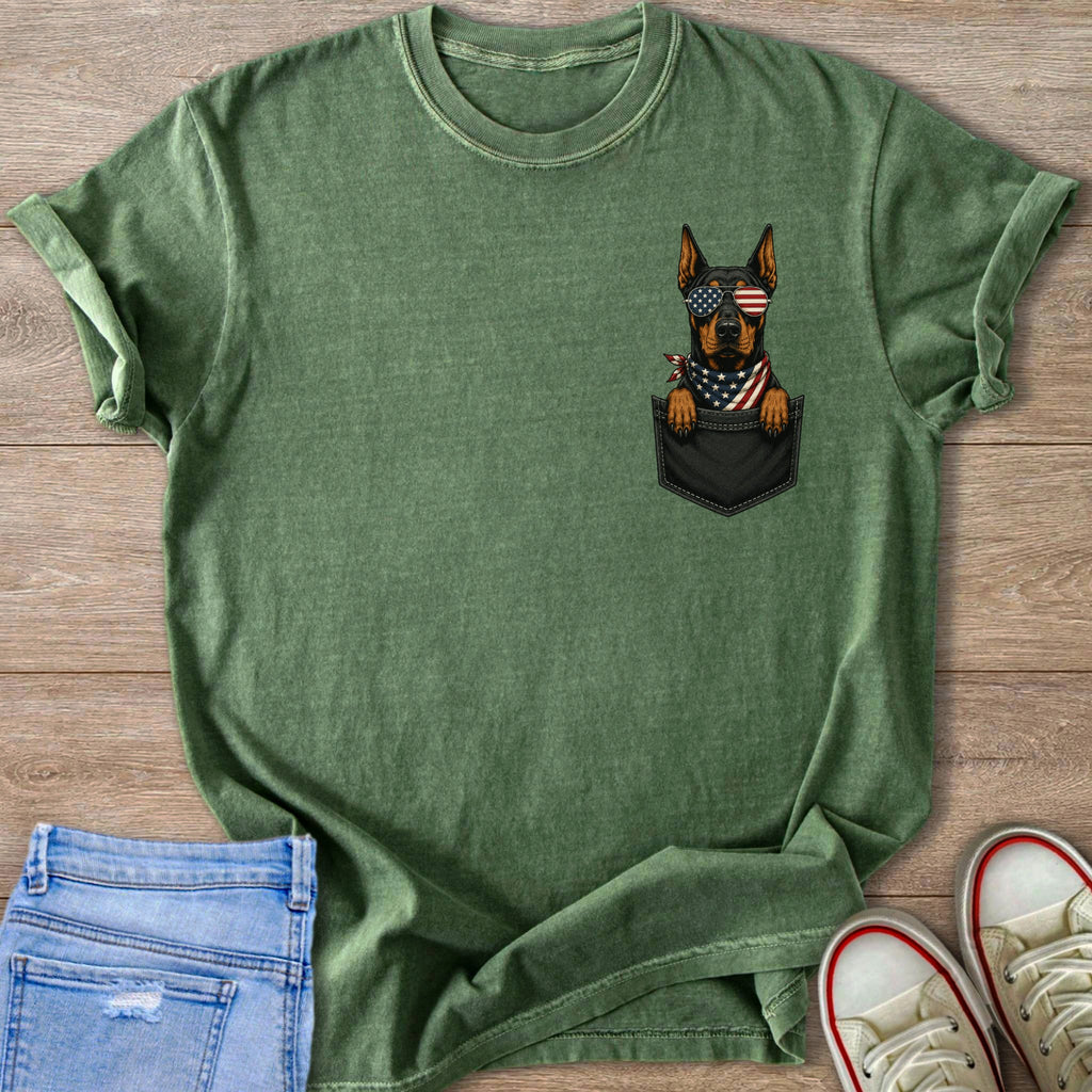 Green t-shirt with a dog wearing American flag sunglasses in a pocket graphic.