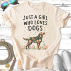 Cream t-shirt with "Just A Girl Who Loves Dogs" and floral dog design.
