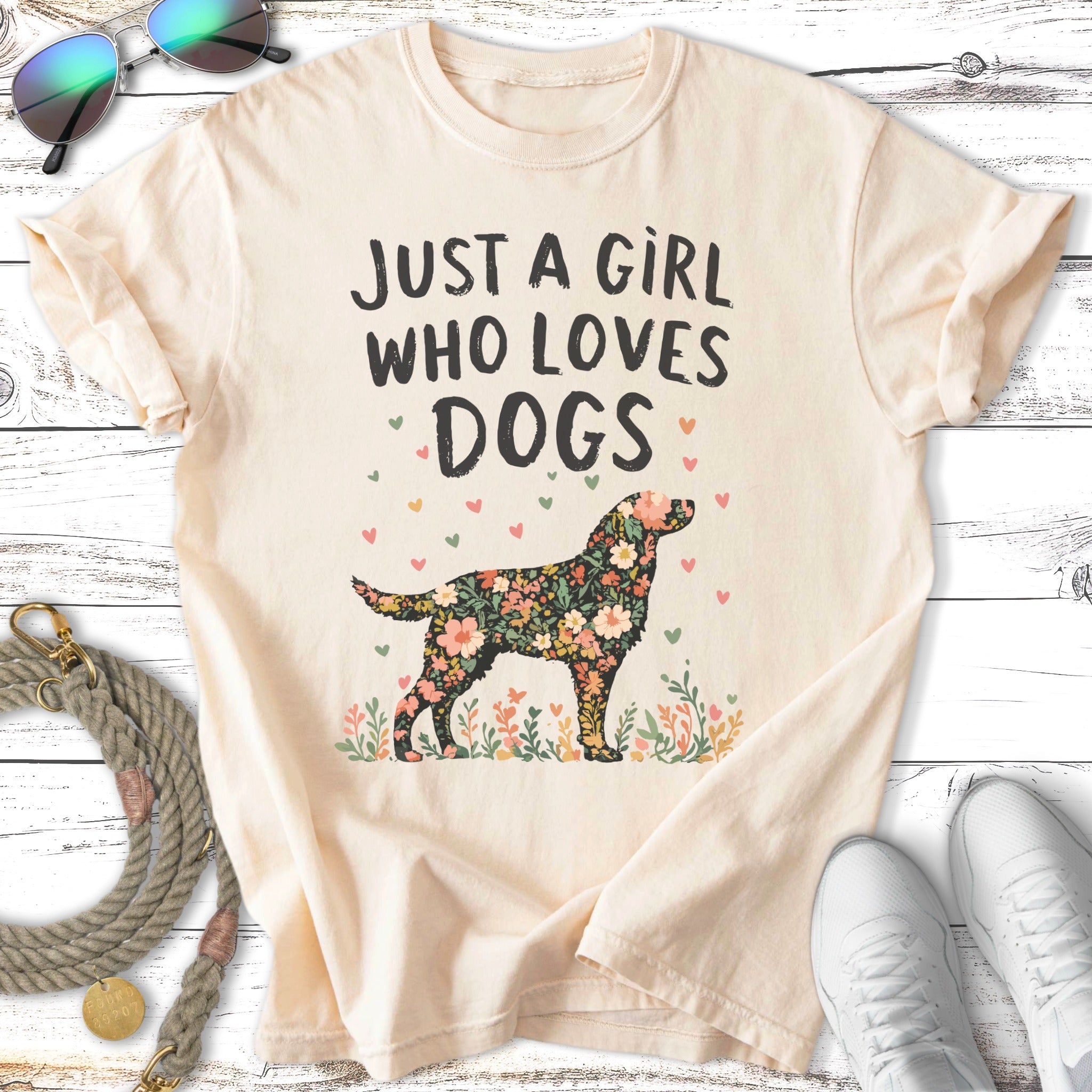 Cream t-shirt with "Just A Girl Who Loves Dogs" and floral dog design.