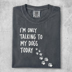 T-shirt with "I'm only talking to my dogs today" text and paw prints.