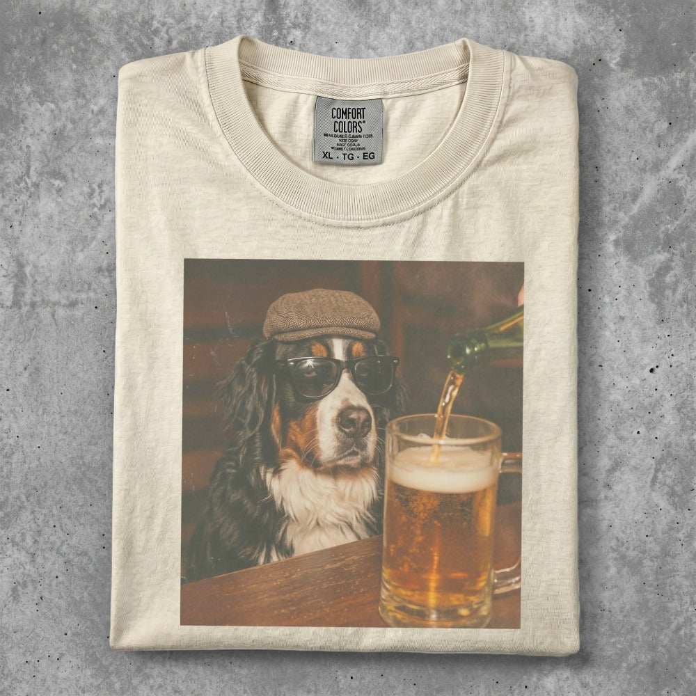 Bernese Mountain Dog wearing sunglasses and hat, drinking beer.