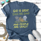 T-shirt with "God is Great Dogs are Good and People are Crazy" text and cartoon dogs.