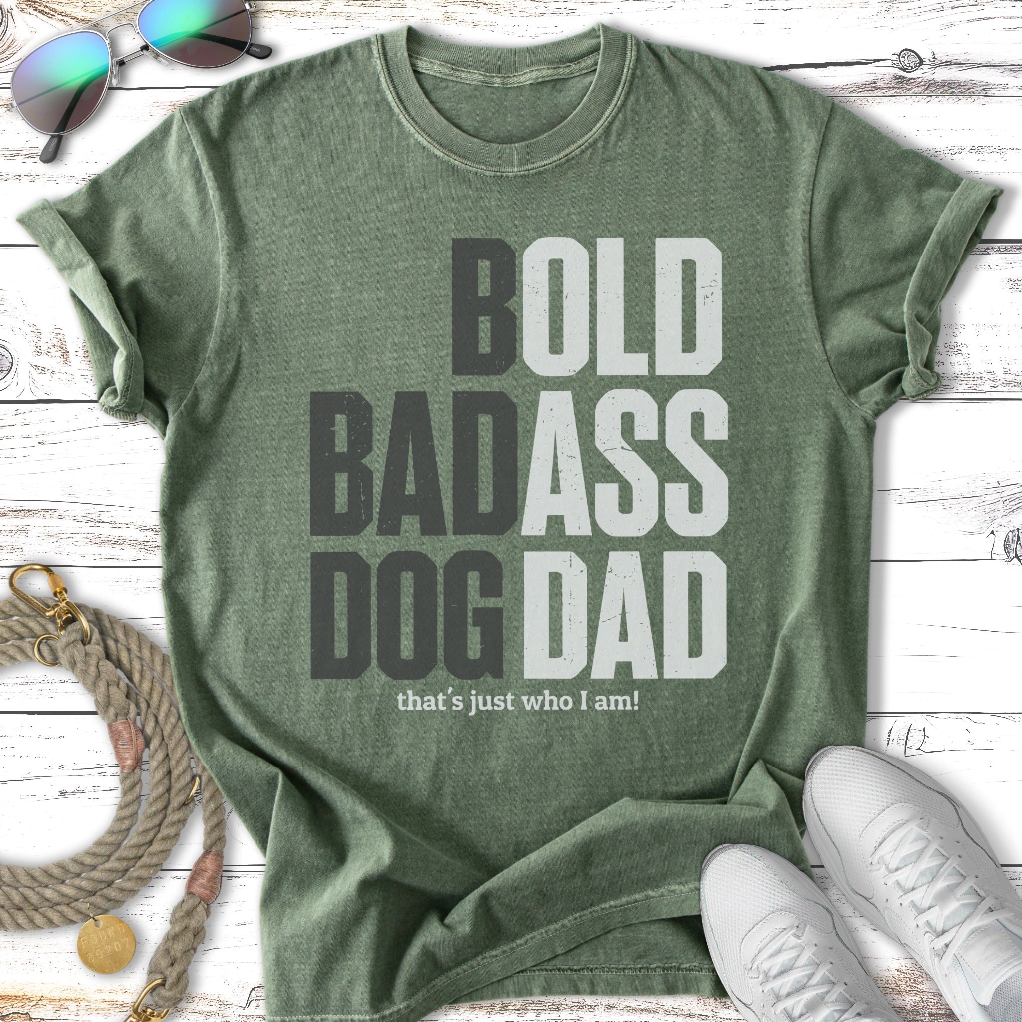 Distressed green t-shirt with "BOLD BADASS DOG DAD that's just who I am!" graphic.